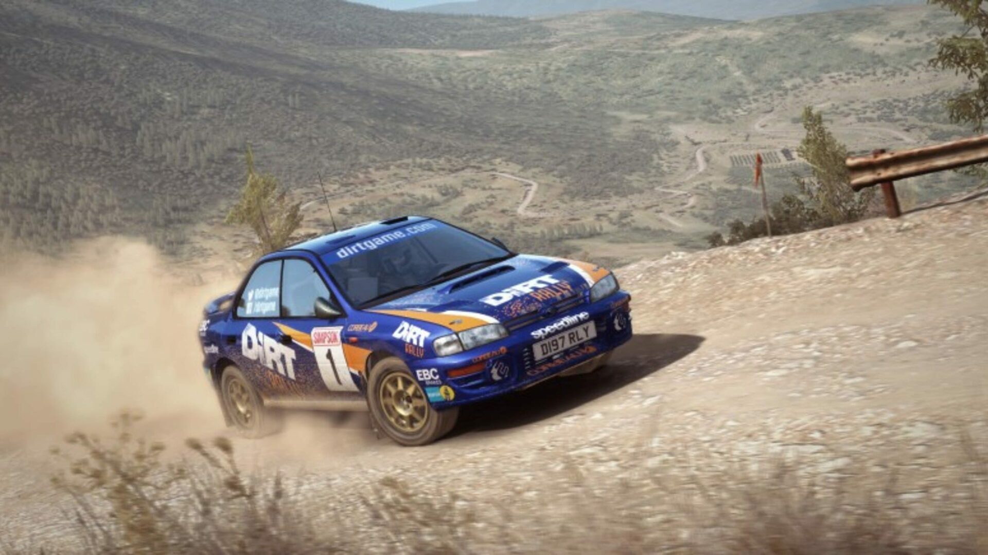 dirt rally car on top of mountain view